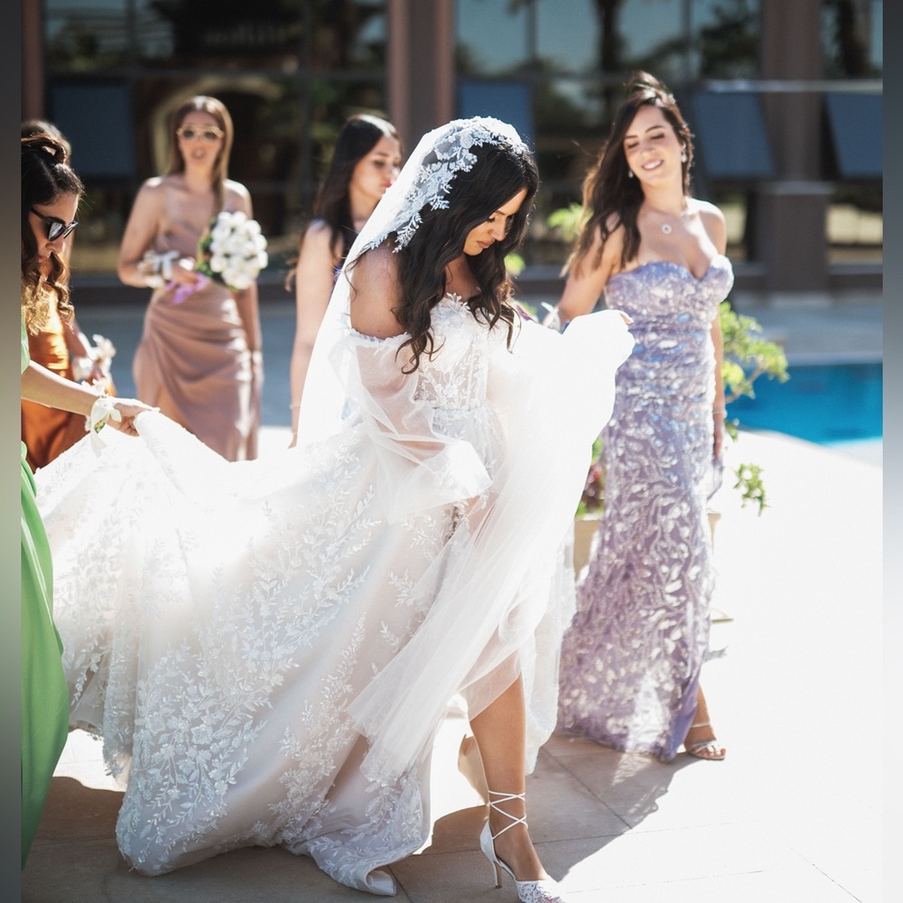 Gahlia Lahav dress, sewed in Egypt with veil and sleeves, fabrics from Italy
